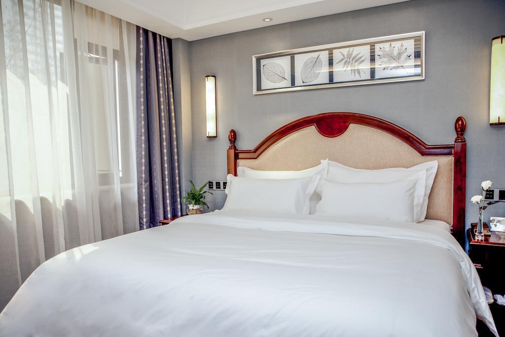 Chengdu Theme Hotel Værelse billede